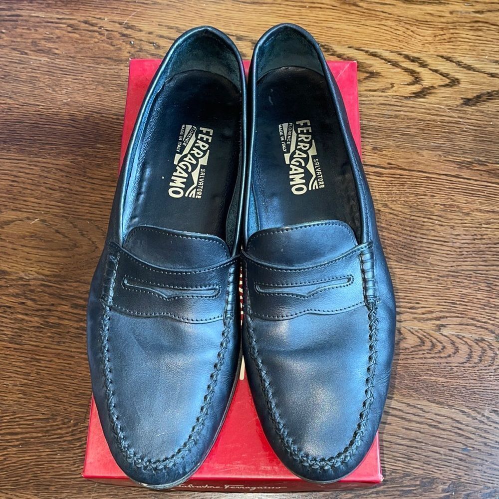 Salvatore Ferragamo “Ponza”‎ black calf slip on penny loafers